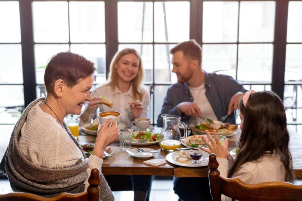 Family hvaing good time at dinner