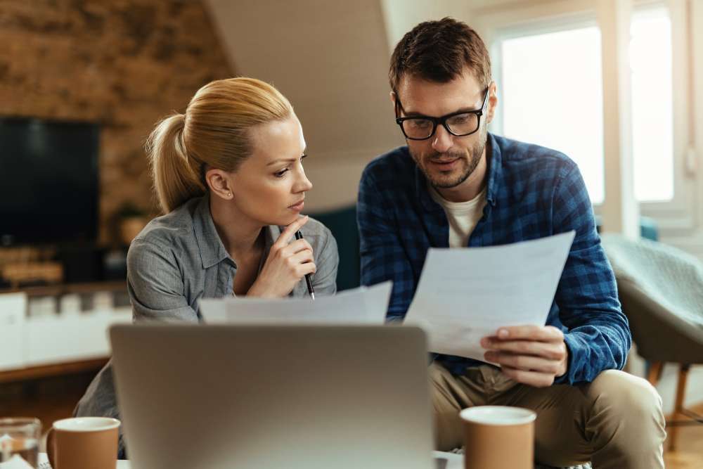 Young Couple understanding property taxes